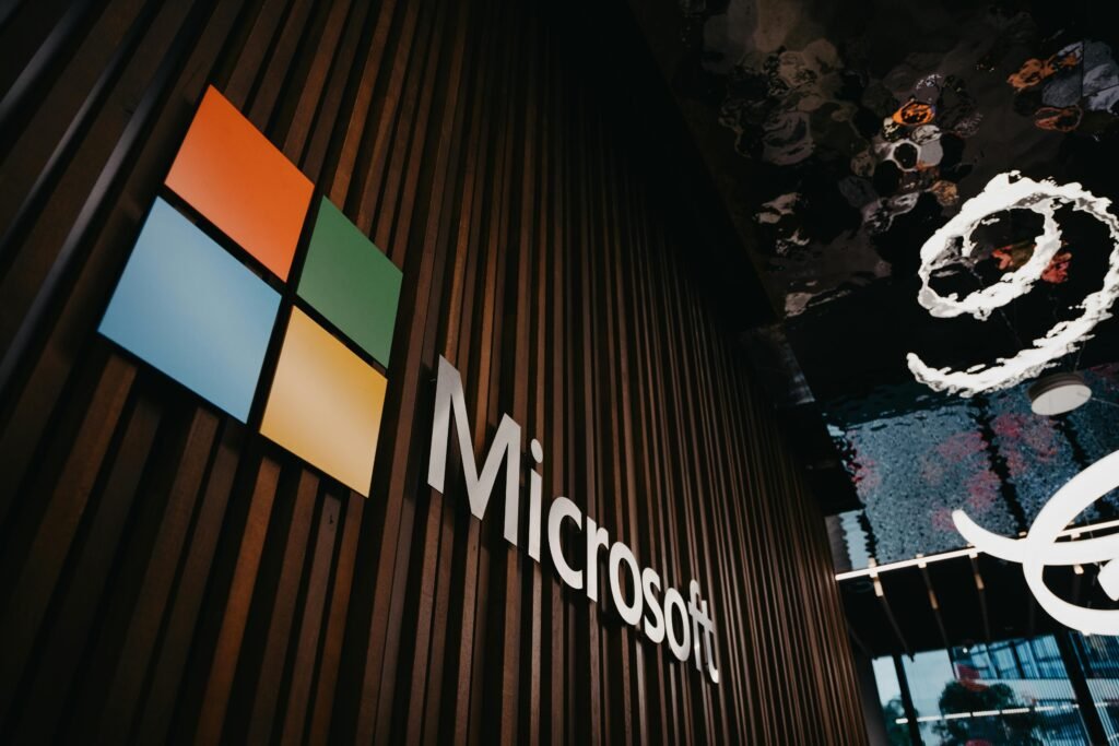 pexels-photo-10142683-10142683-1 Interior view of Microsoft office with logo on wooden wall in Brussels, Belgium.